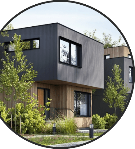 木材と黒い外壁を組み合わせたモダンな二階建て住宅の外観